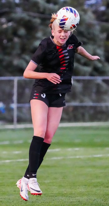 Muskego's Elsa Maurer (3) elevates for a header during the match at home against Waunakee, Friday, April 19, 2024.