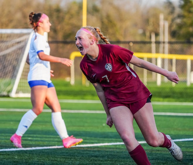 Menomonee Falls' Olive Hathaway (7) celebrates a goal in the match at home against Germantown, Tuesday, April 23, 2024.
